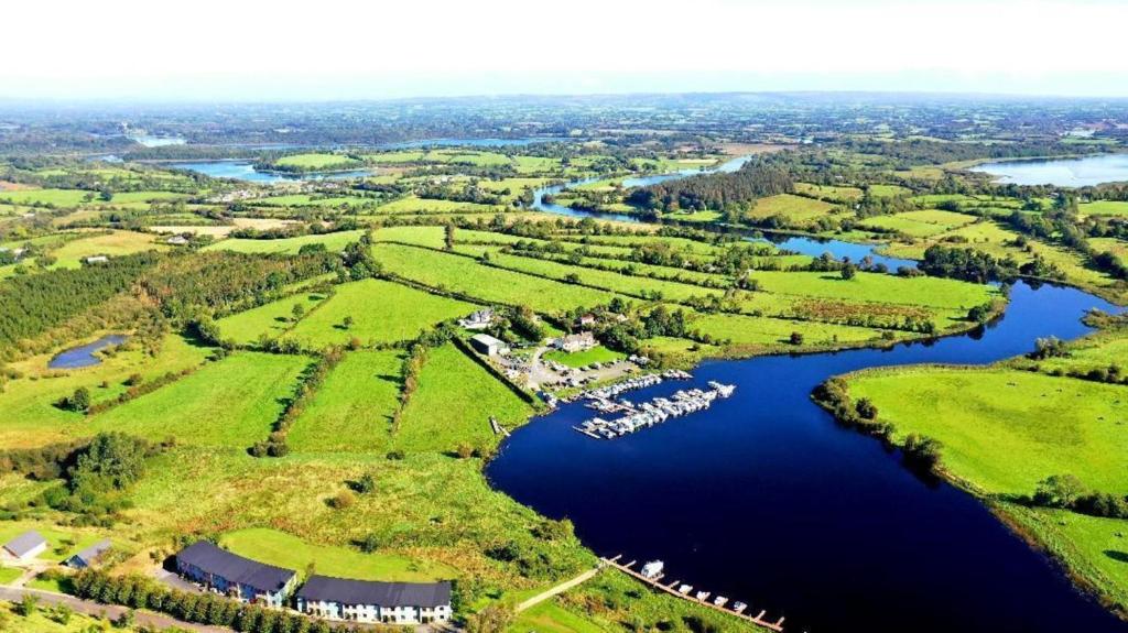 an aerial view of a river with a group of boats at Beautiful 50 Riverun in Belturbet