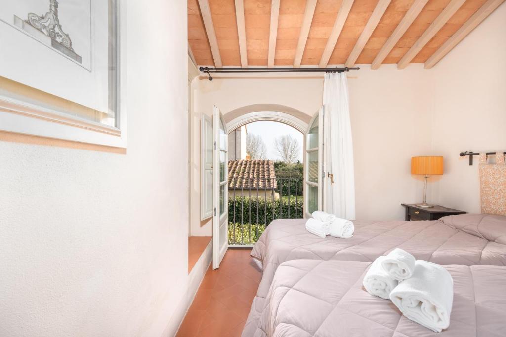 Posteľ alebo postele v izbe v ubytovaní B&B Borgo di Pratavecchie