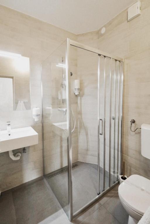 Koupelna v ubytování Hotel Orion