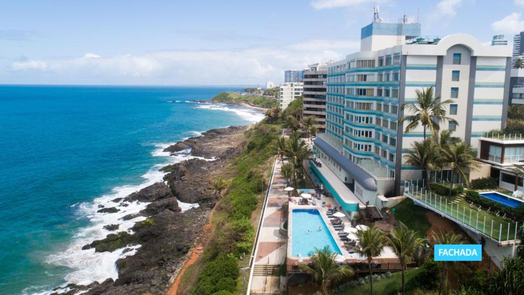 an aerial view of the ocean and a resort at Vila Galé Salvador in Salvador