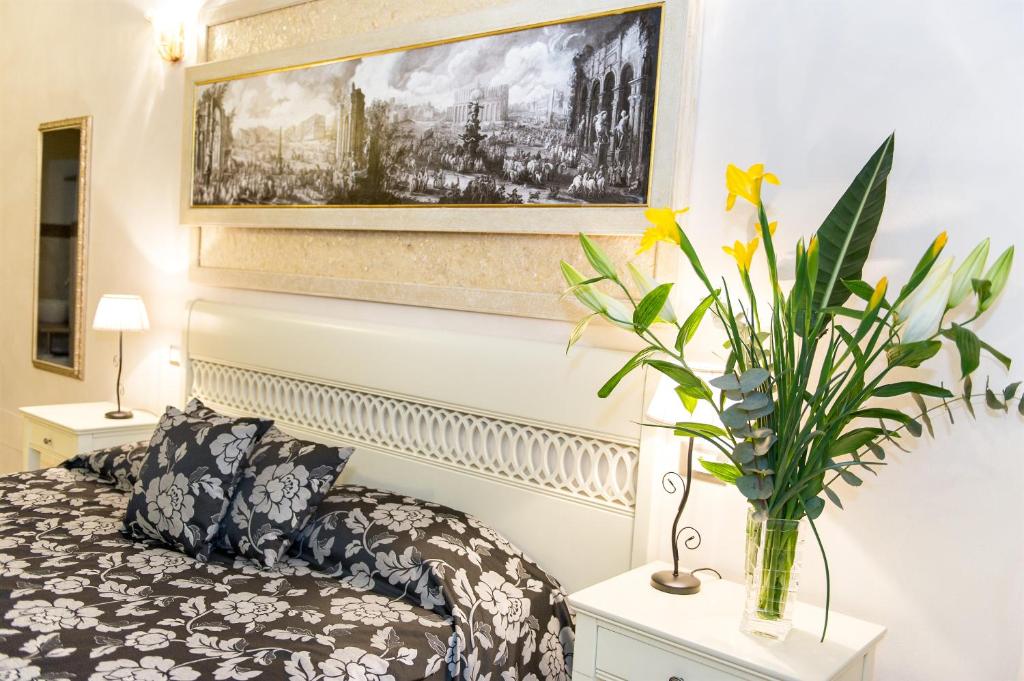 Posteľ alebo postele v izbe v ubytovaní Relais Dei Mercanti B&B And Suites