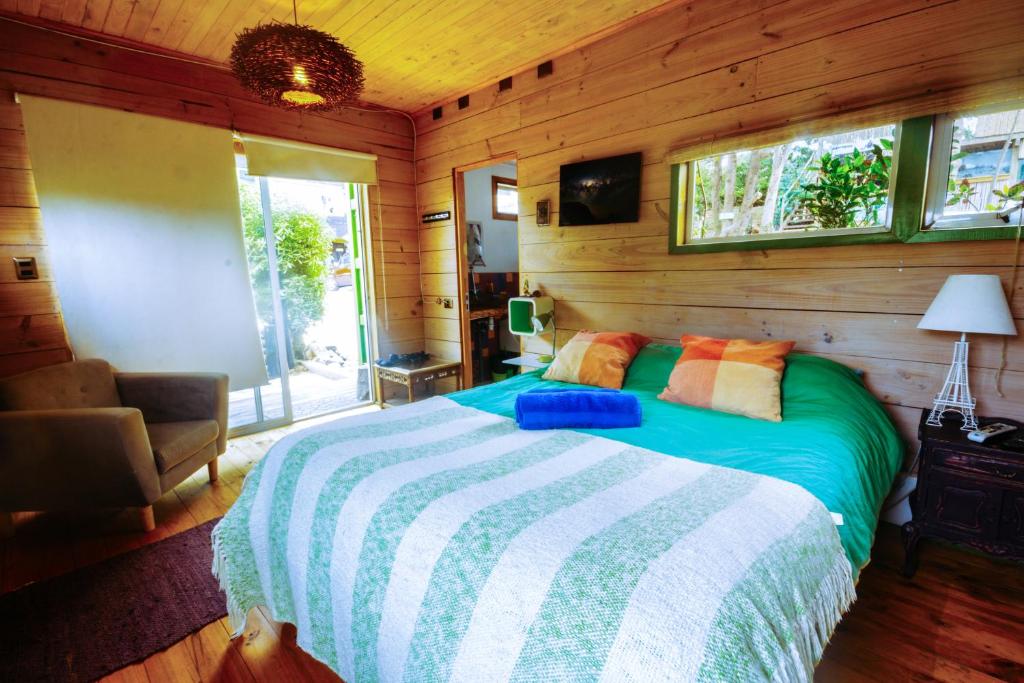 Letto o letti in una camera di Sirena Insolente Hostel & Suites