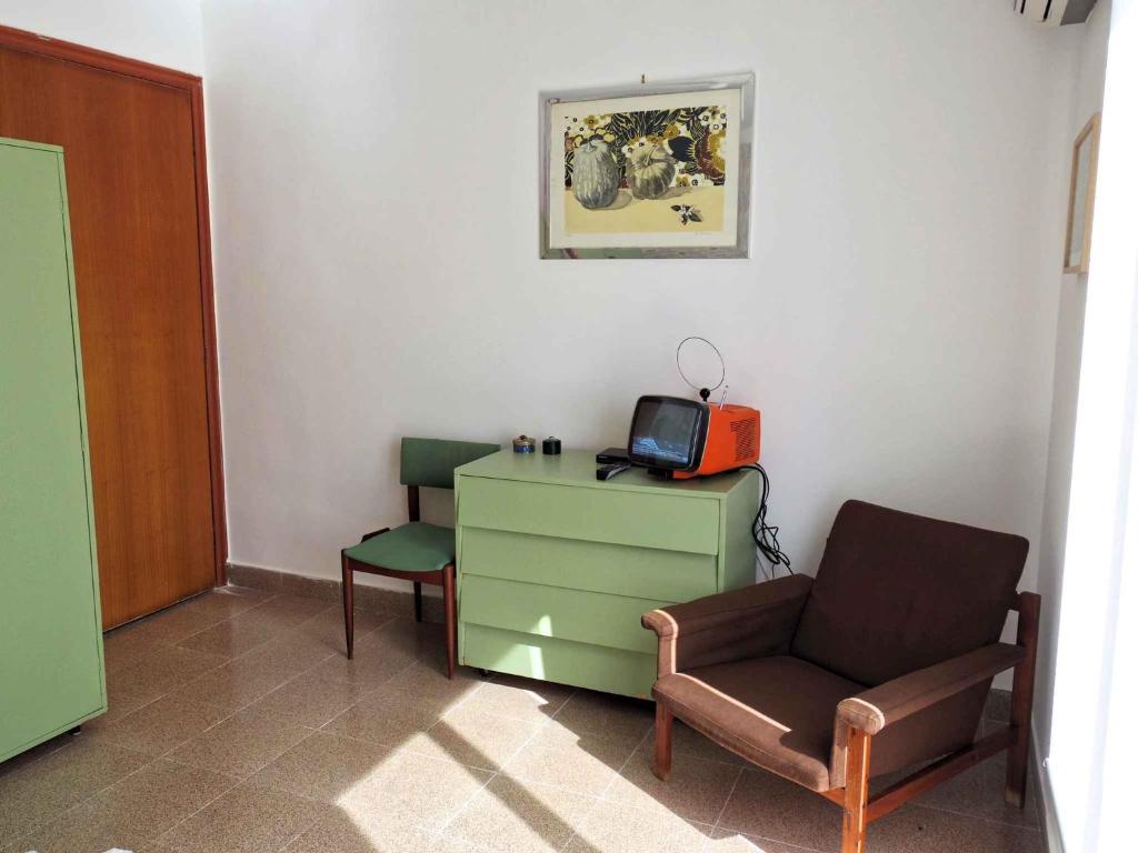 A seating area at Holiday home in Palermo - Sizilien 40734