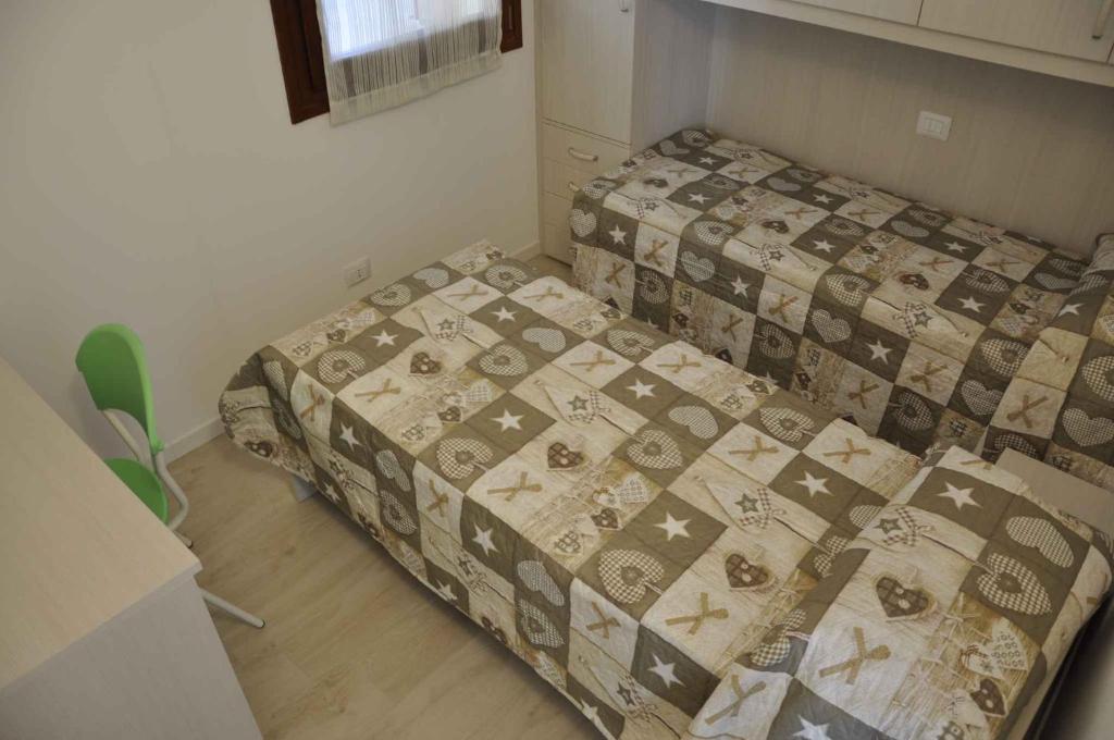 A bed or beds in a room at Apartment in Lazise - Gardasee 38604