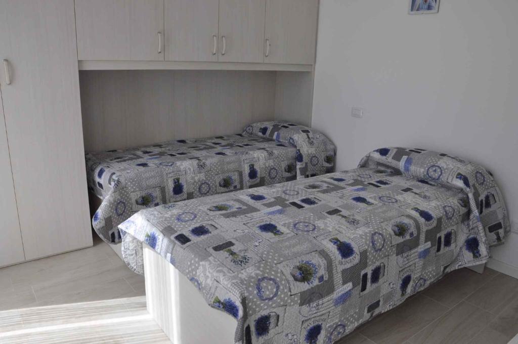 A bed or beds in a room at Apartment in Lazise - Gardasee 38604