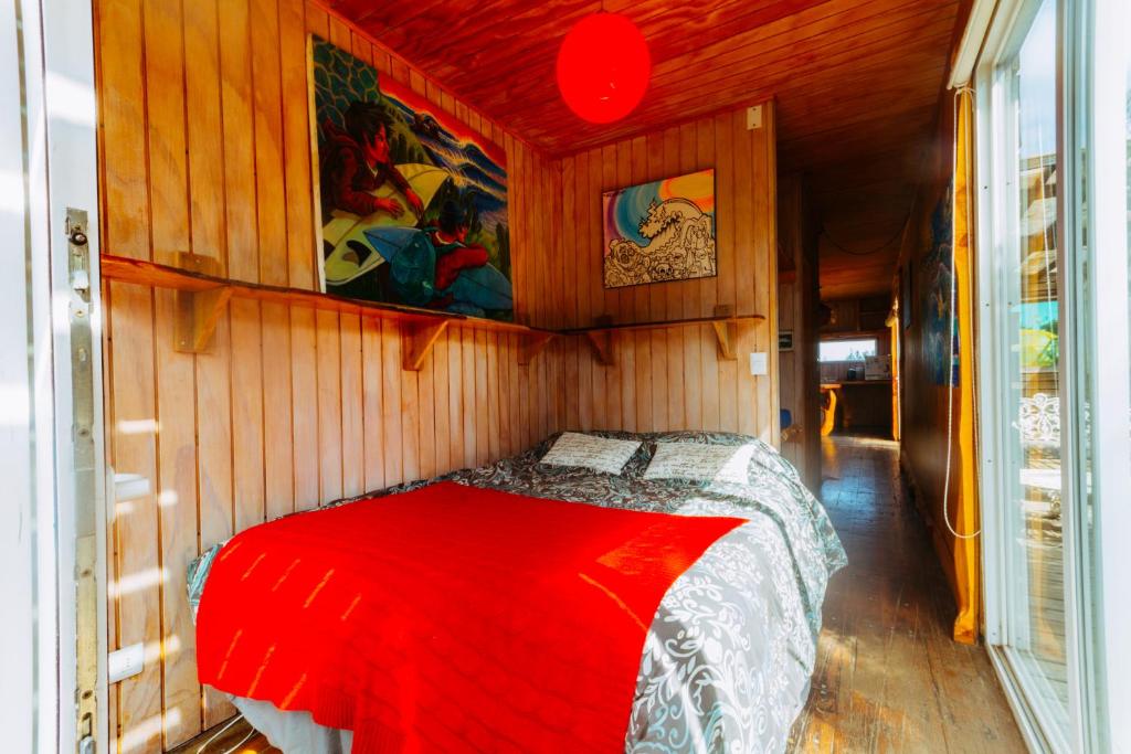 Letto o letti in una camera di Sirena Insolente Hostel & Suites