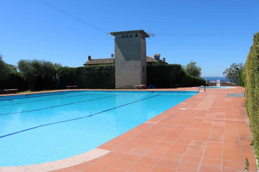 Bazén v ubytovaní Apartment in Bardolino - Gardasee 39722 alebo v jeho blízkosti