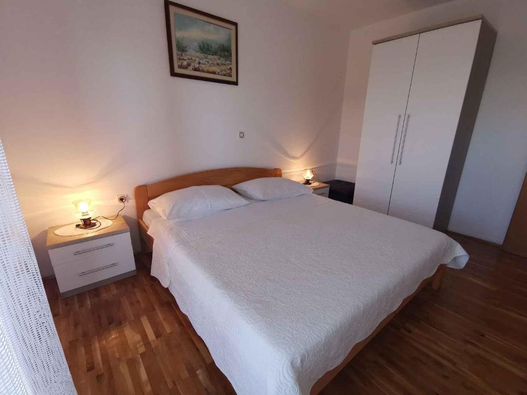 Posteľ alebo postele v izbe v ubytovaní Apartment in Crikvenica 40977
