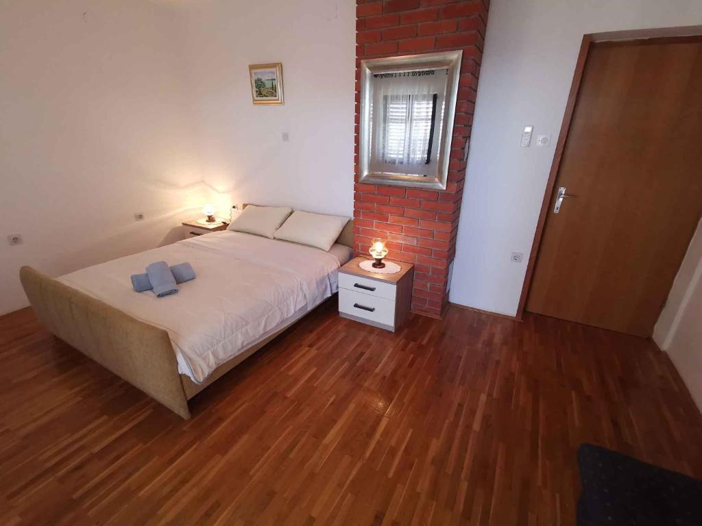 Posteľ alebo postele v izbe v ubytovaní Apartment in Crikvenica 40977