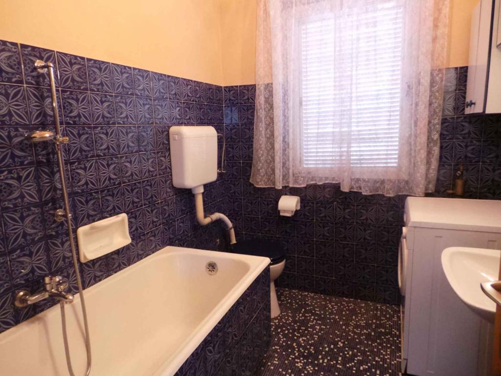 Kúpeľňa v ubytovaní Apartment in Kastav 39570