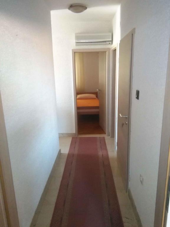 Postel nebo postele na pokoji v ubytování Apartments in Zadar/Zadar Riviera 7794
