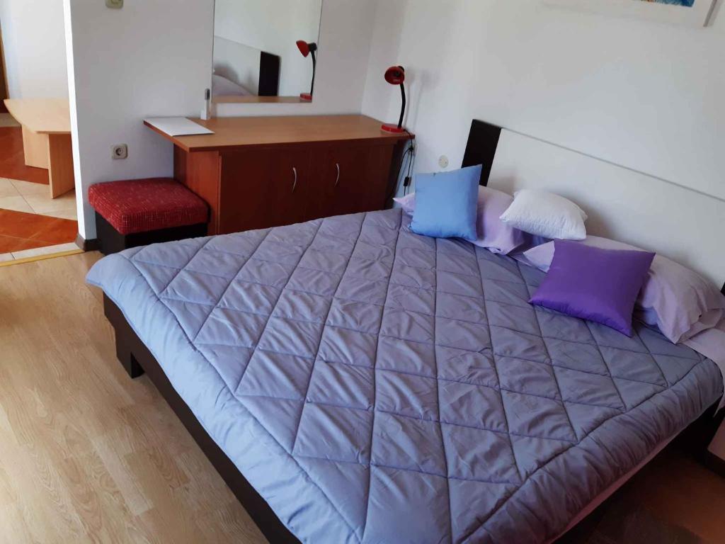 Postel nebo postele na pokoji v ubytování Apartments in Porec/Istrien 37747