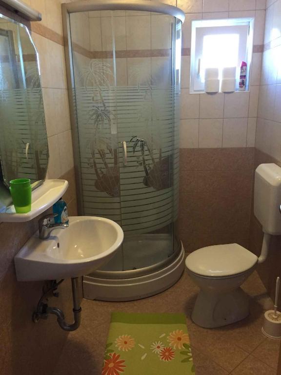 Kúpeľňa v ubytovaní Apartment in Lopar/Insel Rab 37000