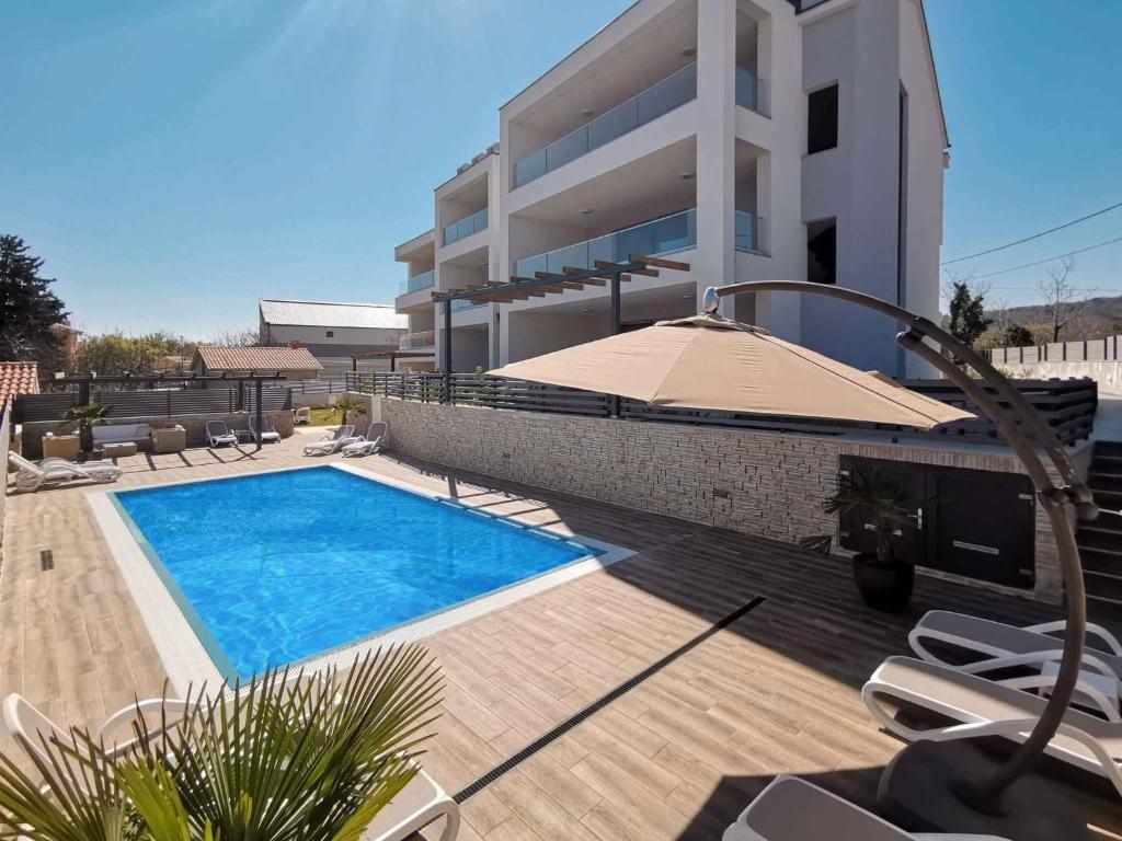 Bazén v ubytování Apartment in Silo/Insel Krk 36991 nebo v jeho okolí