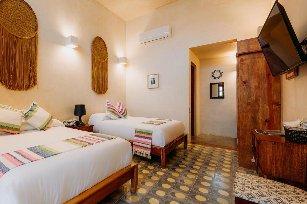 Postel nebo postele na pokoji v ubytování Hotel Waye