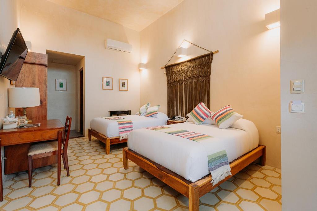 Postel nebo postele na pokoji v ubytování Hotel Waye