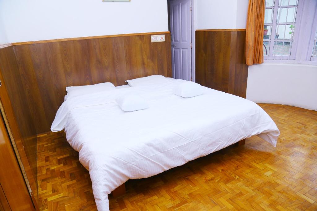 Postel nebo postele na pokoji v ubytování Celestial Resorts