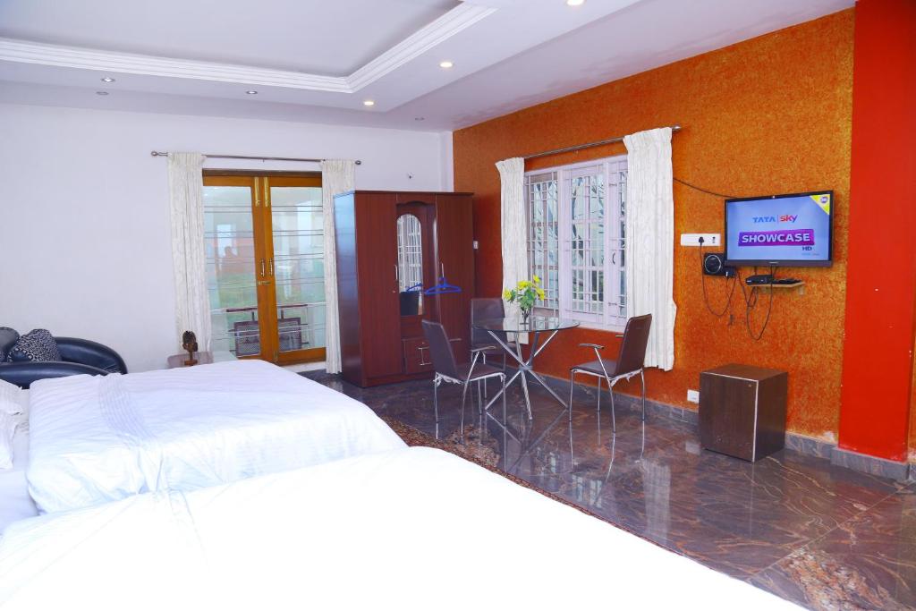 TV a/nebo společenská místnost v ubytování Celestial Resorts