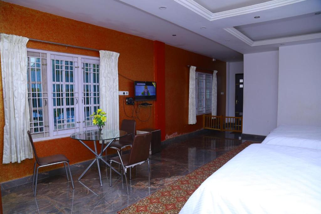 TV a/nebo společenská místnost v ubytování Celestial Resorts