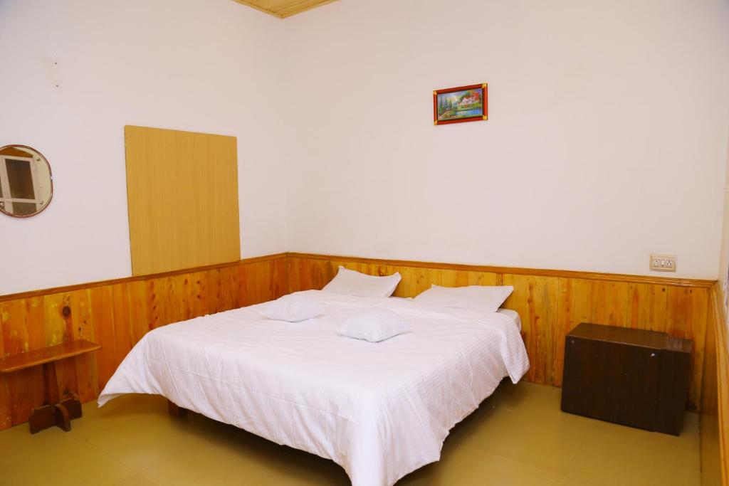 Postel nebo postele na pokoji v ubytování Celestial Resorts