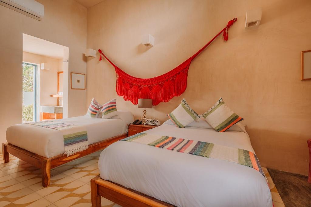 Postel nebo postele na pokoji v ubytování Hotel Waye