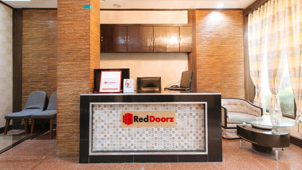 TV a/nebo společenská místnost v ubytování RedDoorz Plus at Canley Residential