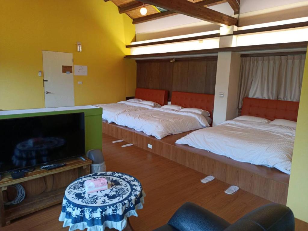 Postel nebo postele na pokoji v ubytování Pear Story House