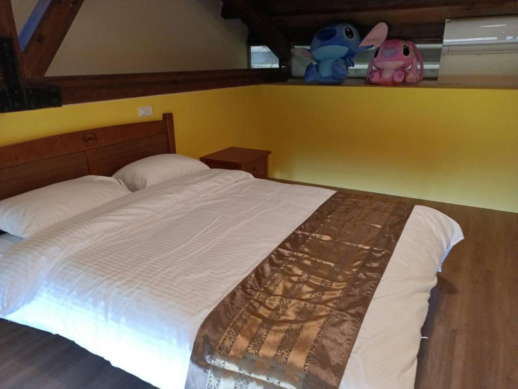 Postel nebo postele na pokoji v ubytování Pear Story House