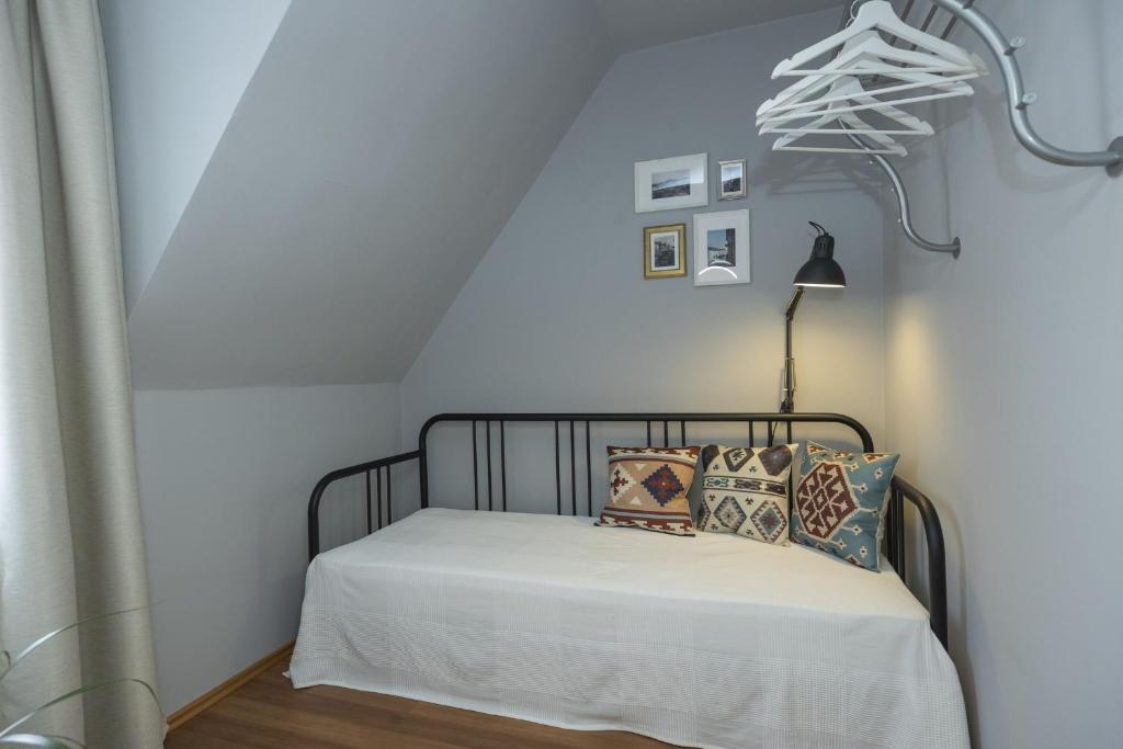 Posteľ alebo postele v izbe v ubytovaní Hősök Apartman