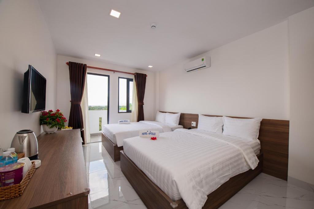 Postel nebo postele na pokoji v ubytování HoTel APOLLO VACATION