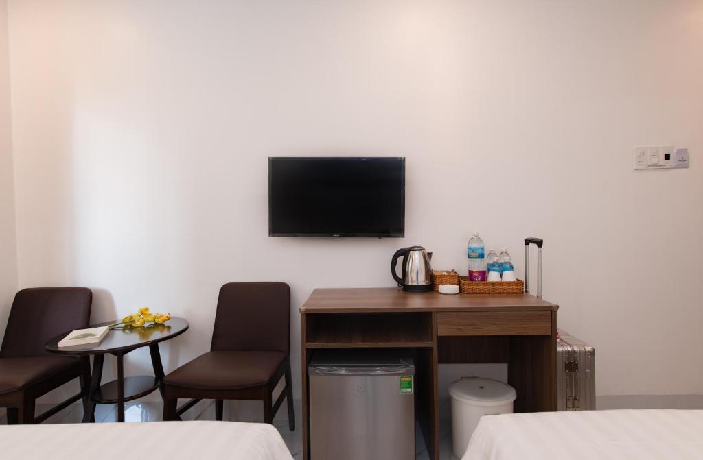 TV a/nebo společenská místnost v ubytování HoTel APOLLO VACATION