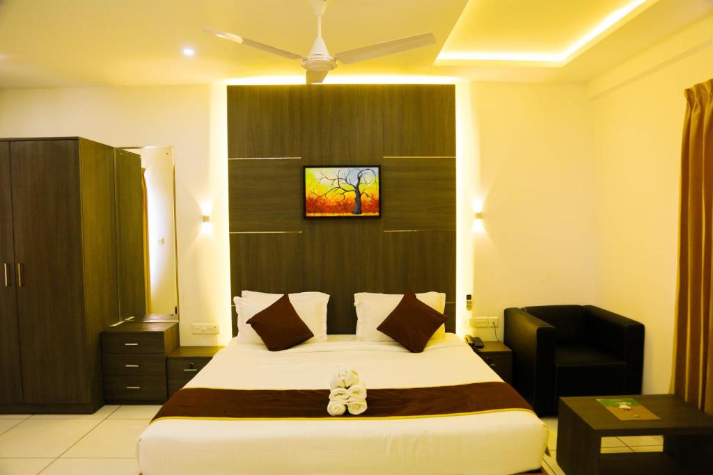 Postel nebo postele na pokoji v ubytování Palette Hill View Resorts Vagamon