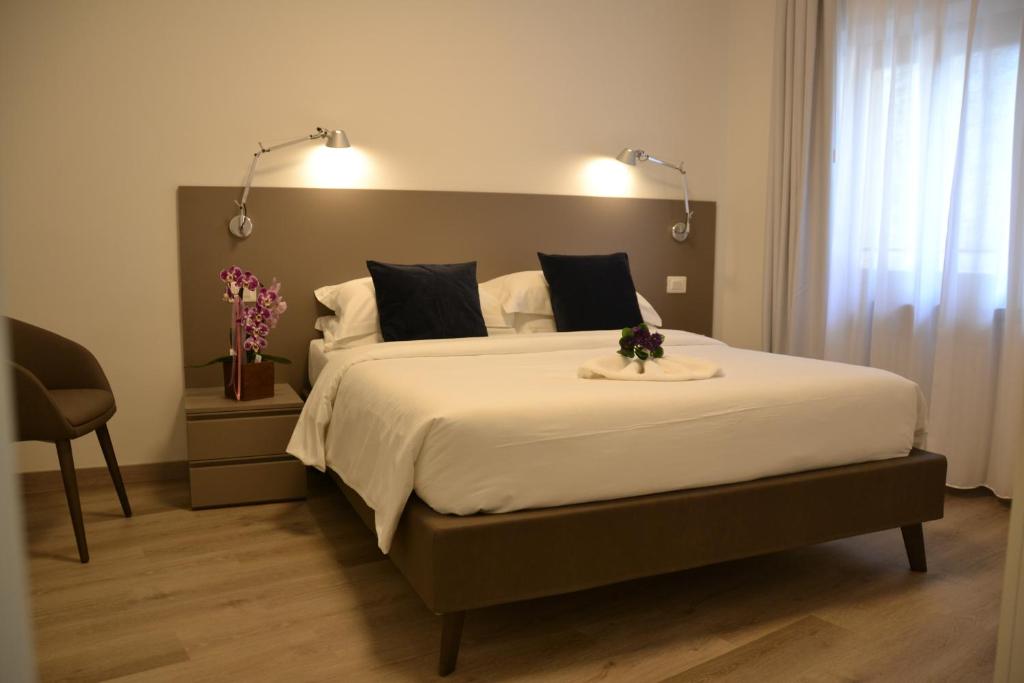 Postel nebo postele na pokoji v ubytování RivAppartamenti