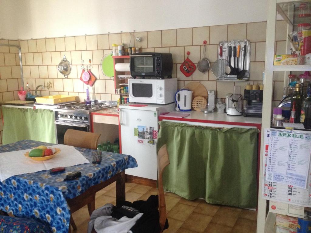 Kuchyň nebo kuchyňský kout v ubytování B&B Relax