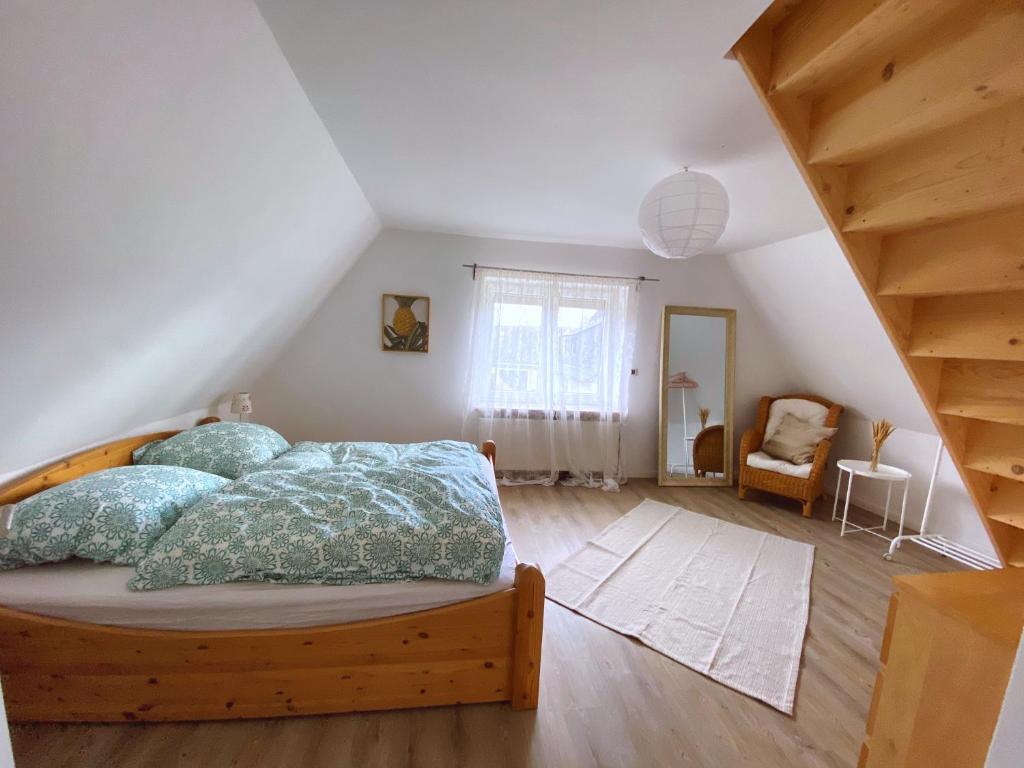 Postel nebo postele na pokoji v ubytování Eckernförder Glück