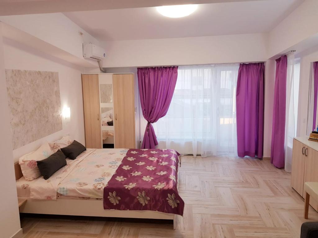 Postel nebo postele na pokoji v ubytování Studio Muncel