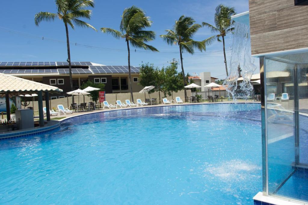 Bazén v ubytování Porto Mar Hotel nebo v jeho okolí