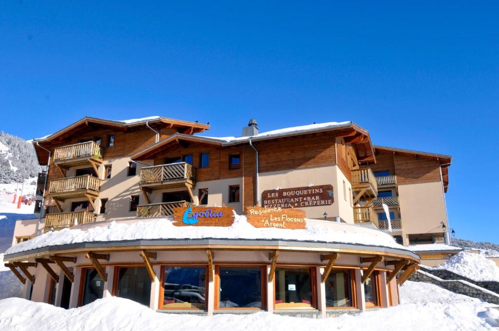 a building on top of a snow covered mountain at Résidence Goélia Les Flocons d'Argent in Aussois