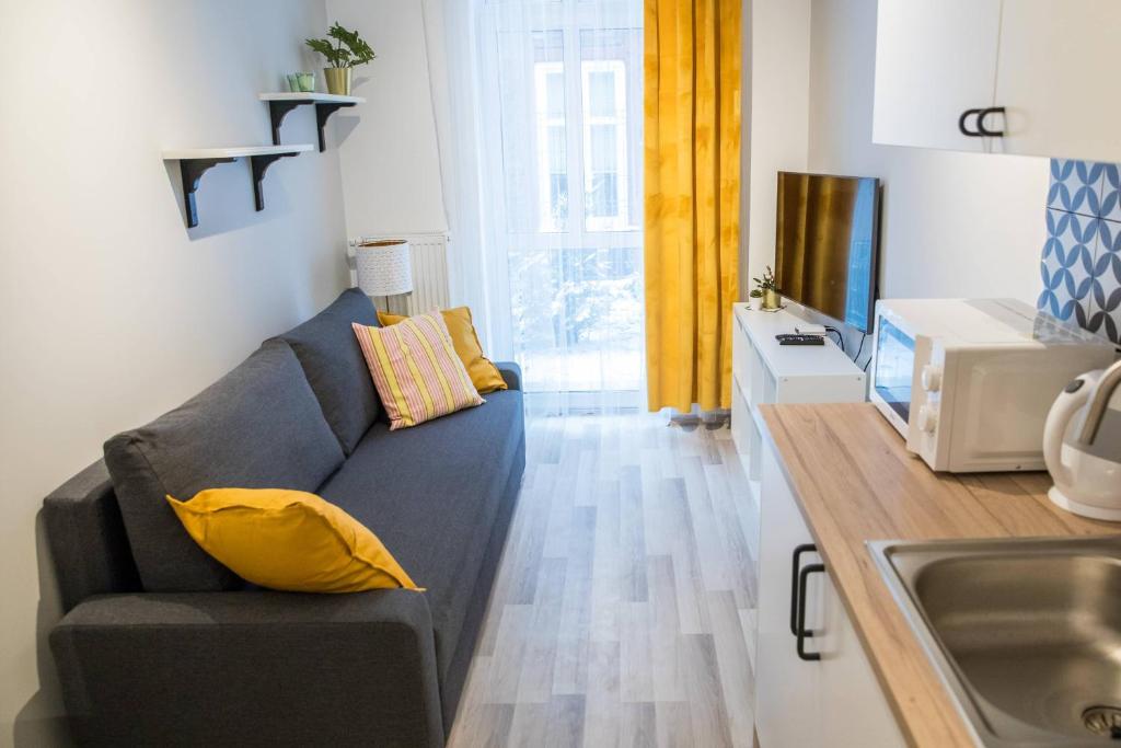 Posedenie v ubytovaní Hey Stay Apartment with private garden