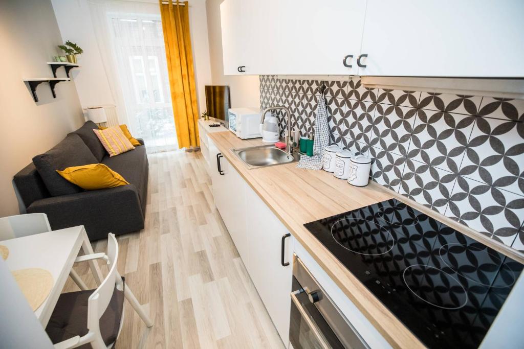 Posedenie v ubytovaní Hey Stay Apartment with private garden