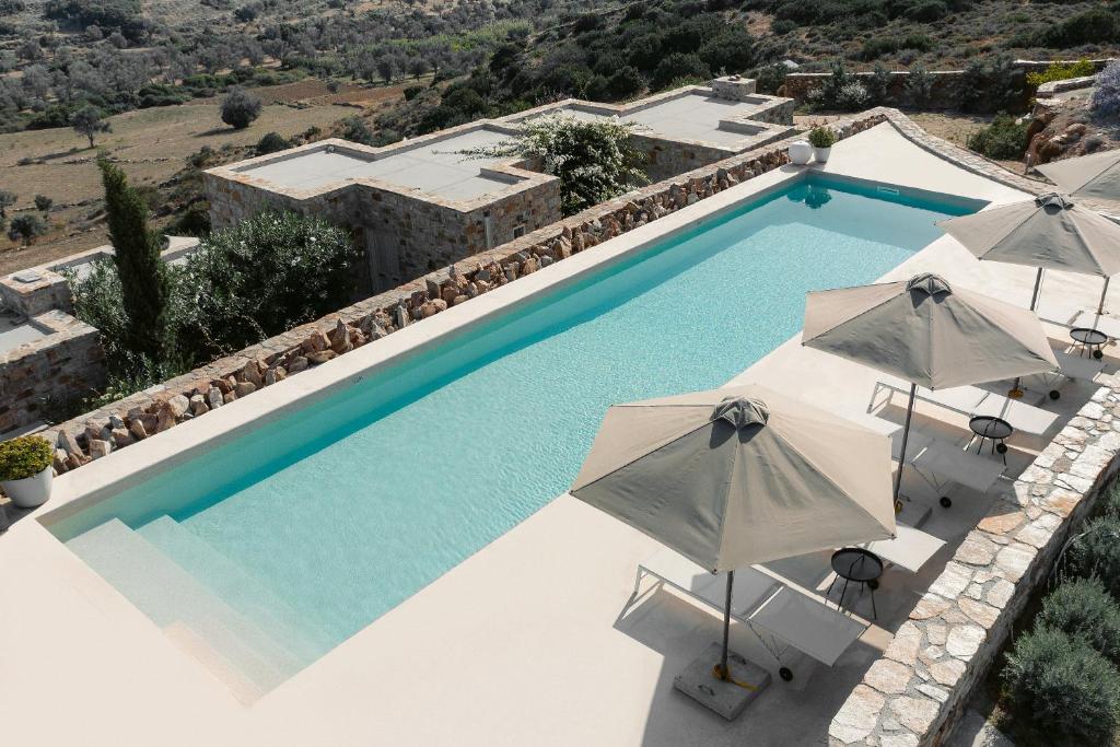 Bazén v ubytování Ayiopetra Exclusive Getaways nebo v jeho okolí