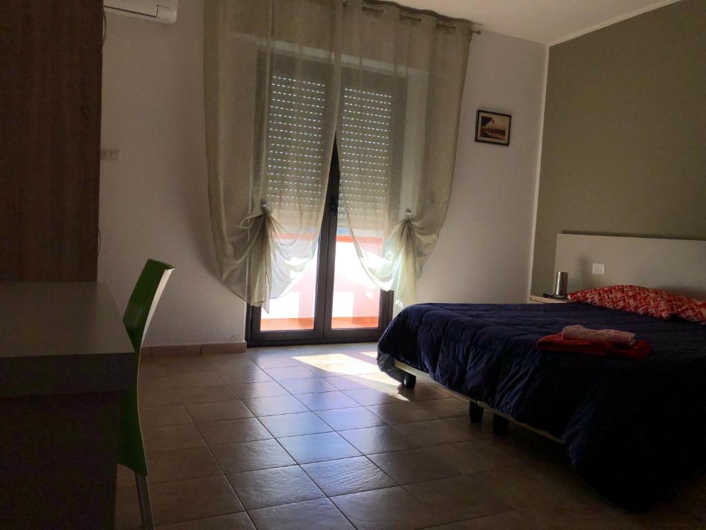 Postel nebo postele na pokoji v ubytování B&b Paolo e Daniela