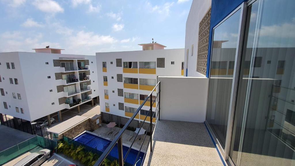 an aerial view of a building with a balcony at Loft 10 min from Oro &Holy Beach, Marina, Galerias in Puerto Vallarta