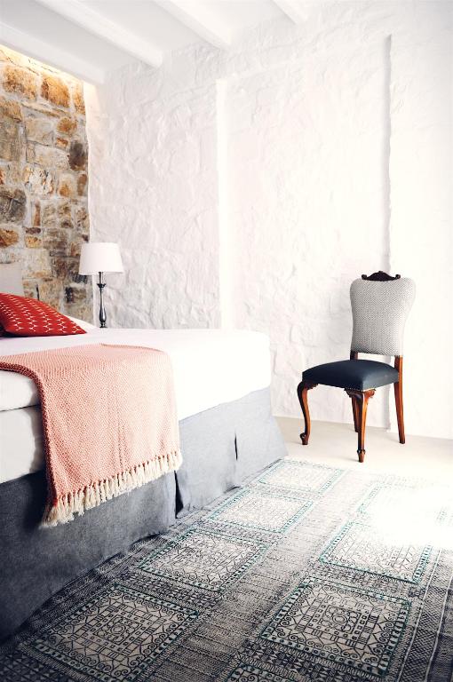 Postel nebo postele na pokoji v ubytování Ayiopetra Exclusive Getaways