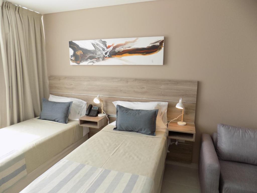 Кровать или кровати в номере Inizio Hotel by Kube Mgmt