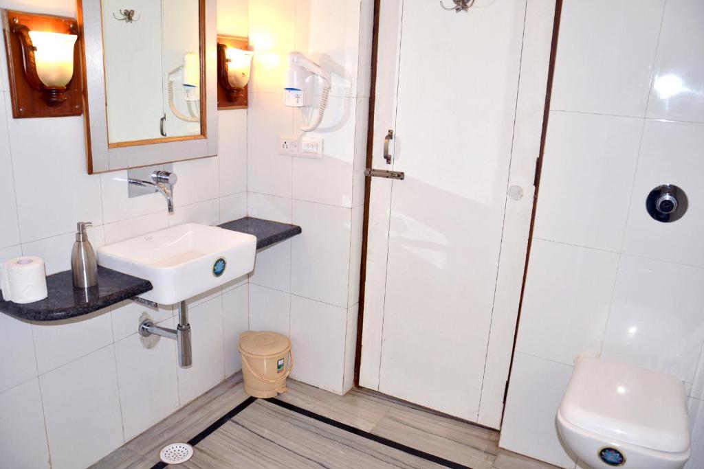 Koupelna v ubytování Hotel Sunbird