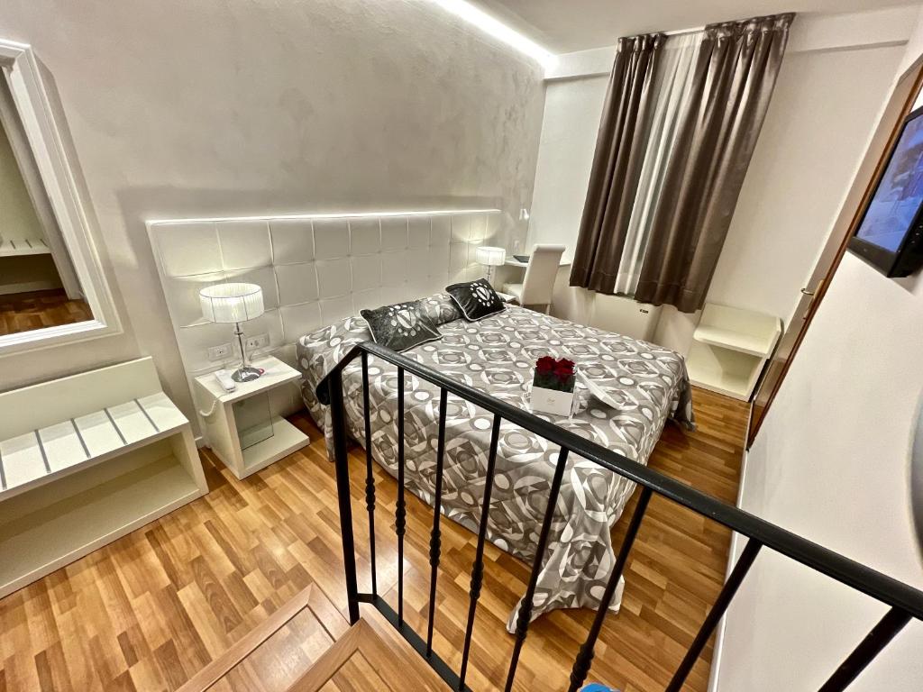 Postel nebo postele na pokoji v ubytování Hotel Vivit ***S