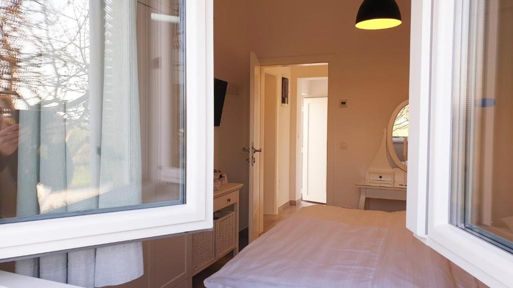 Postel nebo postele na pokoji v ubytování Ferienhaus Rovinj mit Pool