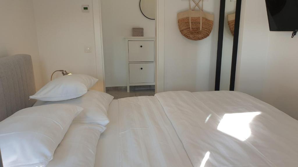 Postel nebo postele na pokoji v ubytování Ferienhaus Rovinj mit Pool