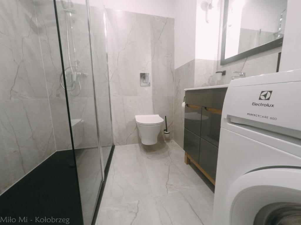 Kúpeľňa v ubytovaní MiłoMi Apartamenty Kołobrzeg
